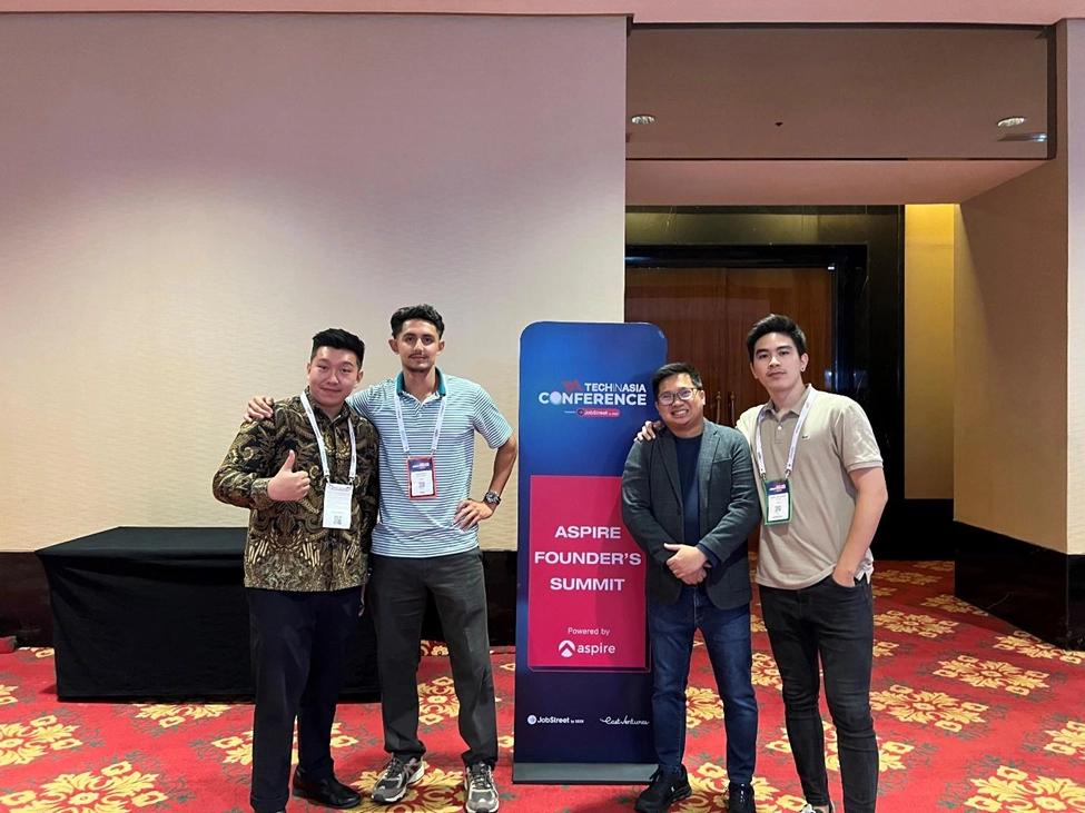 AccessGov’s President Bryce Refuerzo with three other attendees of Tech in Asia Conference 2023 posing for a picture